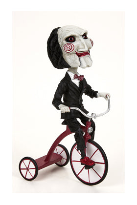 Figura neca saw head knocker puppet on tricyclesue)